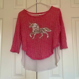 A beautiful sequined unicorn high low top!